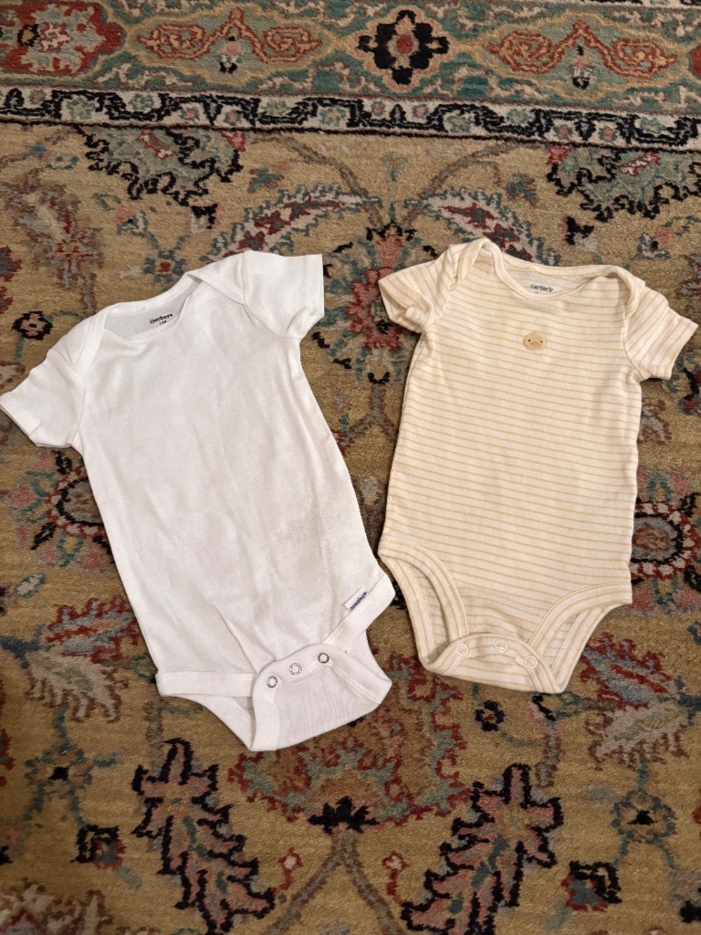 Pair of onesies.